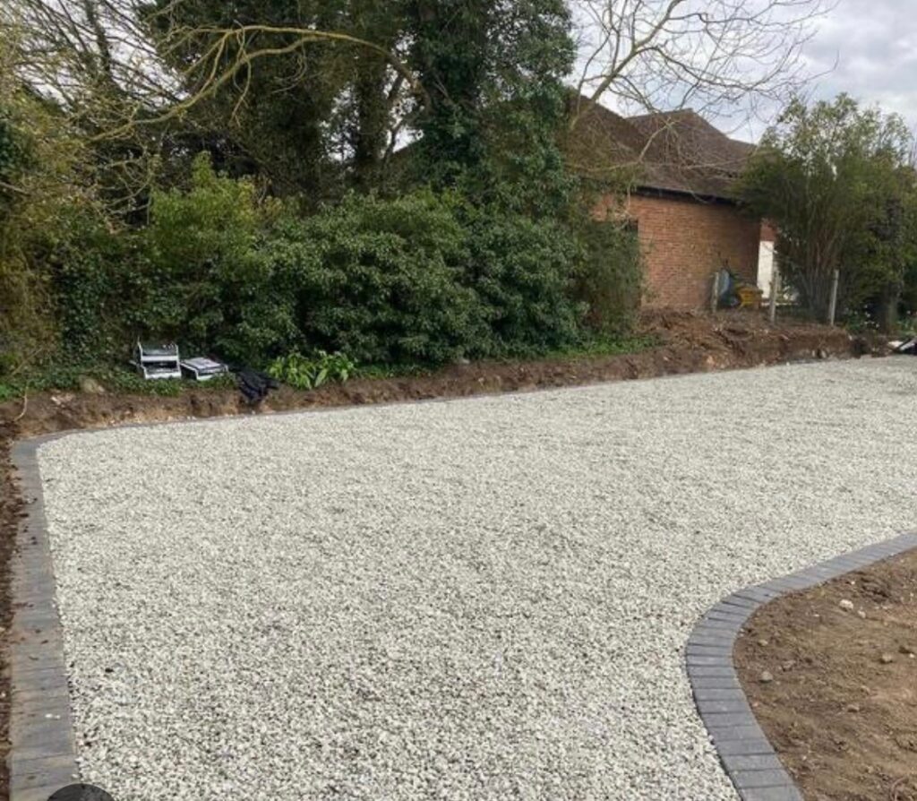 FULL BUCKET OF LIMESTONE GRAVEL